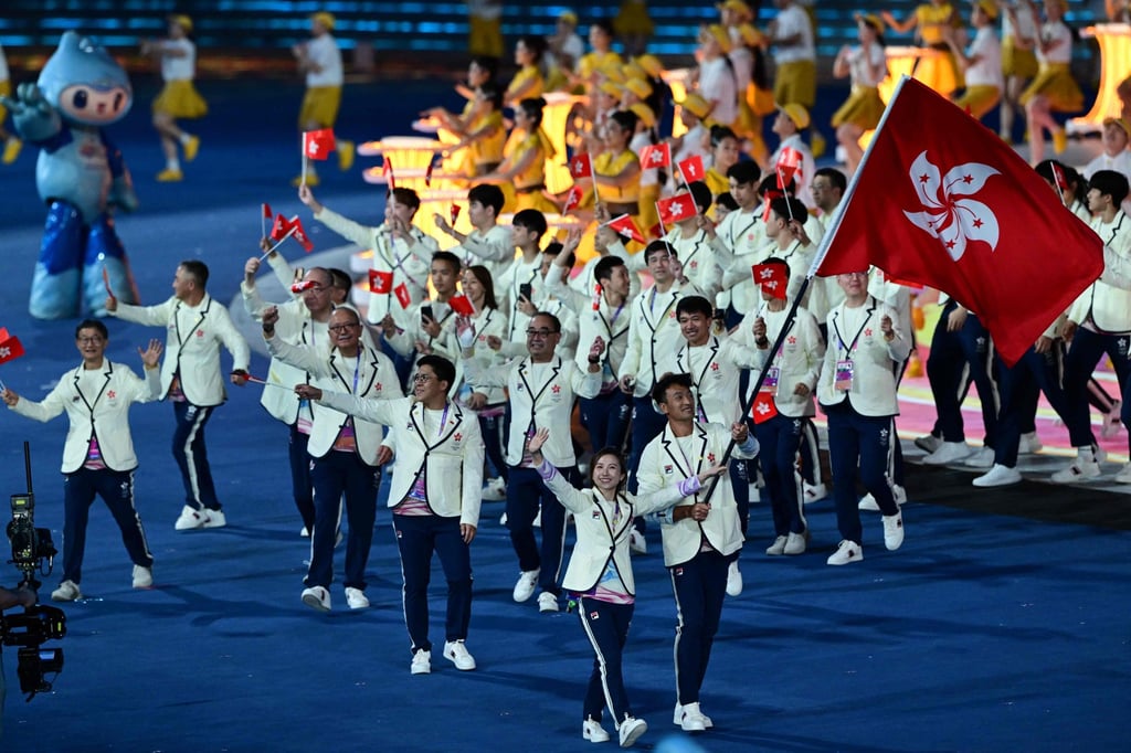 Hong Kong’s delegation take part in the athletes parade during the opening ceremony. Photo: AFP