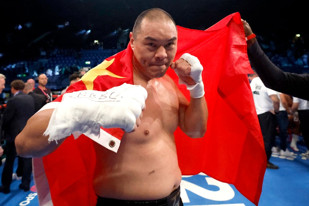 Zhang celebrates in the ring at Wembley Arena after his demolition job on Joyce. Photo: Action Images via Reuters Zhang celebrates in the ring at Wembley Arena after his demolition job on Joyce. Photo: Action Images via Reuters