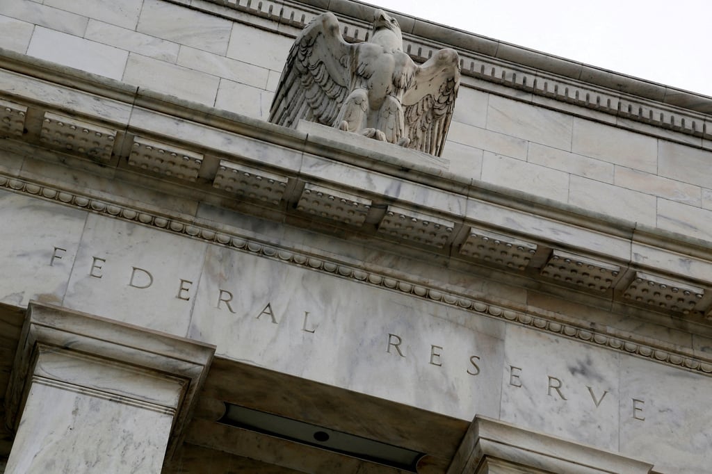 The Federal Reserve, after raising interest 11 times since March 2022, has taken a breather, fuelling hopes that the rate hikes may have come to an end. Photo: Reuters The Federal Reserve, after raising interest 11 times since March 2022, has taken a breather, fuelling hopes that the rate hikes may have come to an end. Photo: Reuters