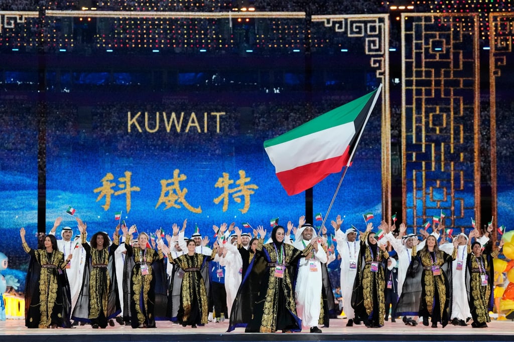 Kuwait’s athletes look dazzling in their outfits. Photo: AP Kuwait’s athletes look dazzling in their outfits. Photo: AP
