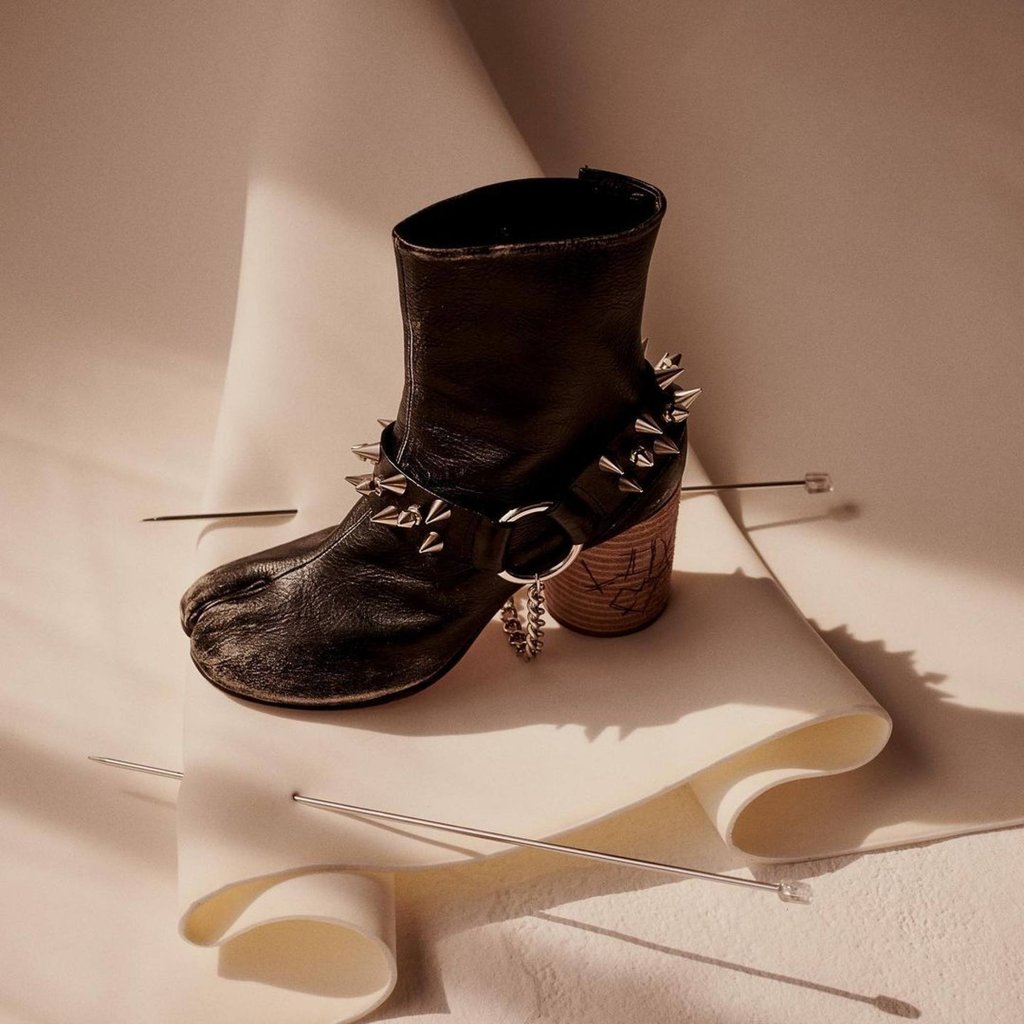 This Tabi boot from Maison Margiela’s spring/summer 2020 collection features punk studs and chains. Photo: @maisonmargiela/Instagram