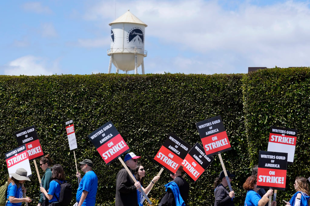 Striking writers in front of Paramount Pictures studio in Los Angeles. File photo: AP Striking writers in front of Paramount Pictures studio in Los Angeles. File photo: AP