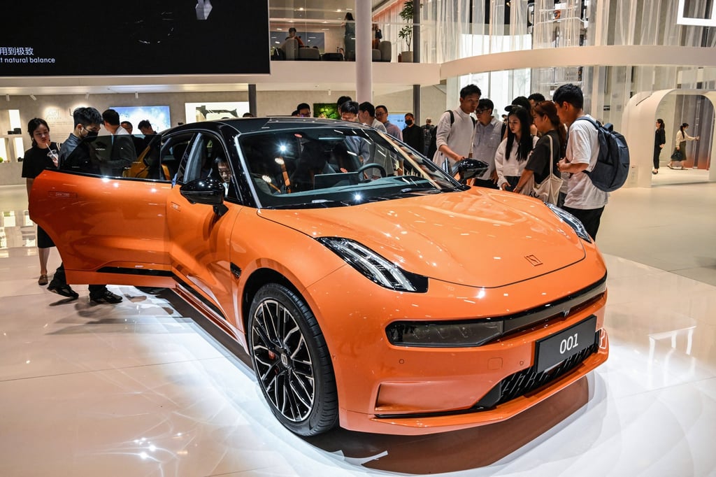 People look at a Zeekr 001 during the 20th Shanghai International Automobile Industry Exhibition in Shanghai on April 18, 2023. Photo: AFP People look at a Zeekr 001 during the 20th Shanghai International Automobile Industry Exhibition in Shanghai on April 18, 2023. Photo: AFP