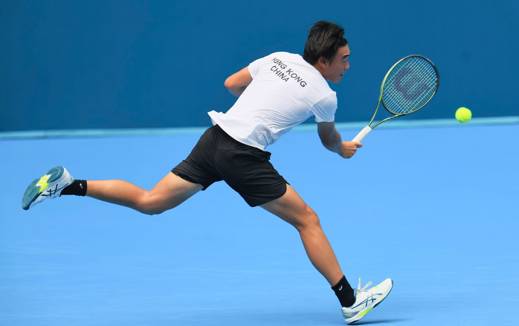 Coleman Wong Chak-lam gets seven straight points in the tie-breaker to seal a victory. Photo: Dickson Lee Coleman Wong Chak-lam gets seven straight points in the tie-breaker to seal a victory. Photo: Dickson Lee