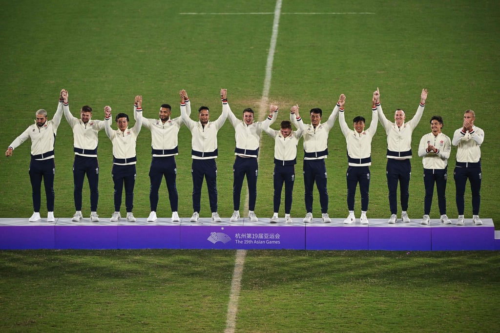 Hong Kong’s men celebrate their Asian Games gold in the rugby sevens. Photo: AFP Hong Kong’s men celebrate their Asian Games gold in the rugby sevens. Photo: AFP