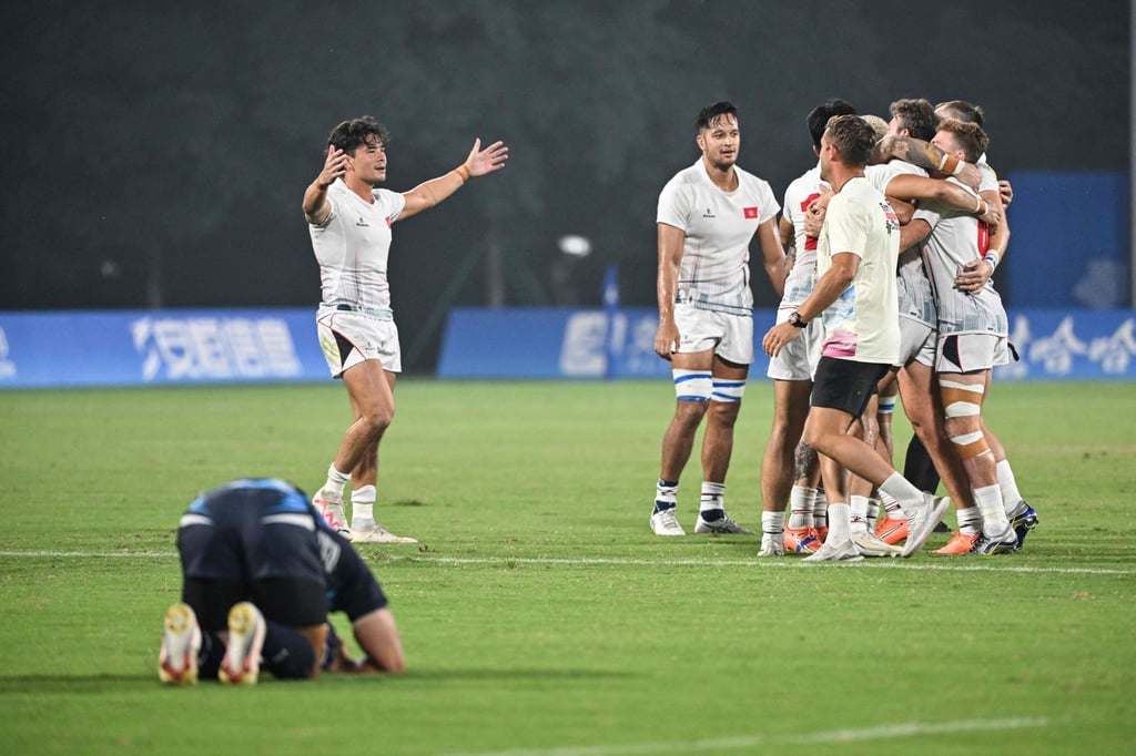 Hong Kong’s rugby sevens players celebrate their win against South Korea. Photo: AFP