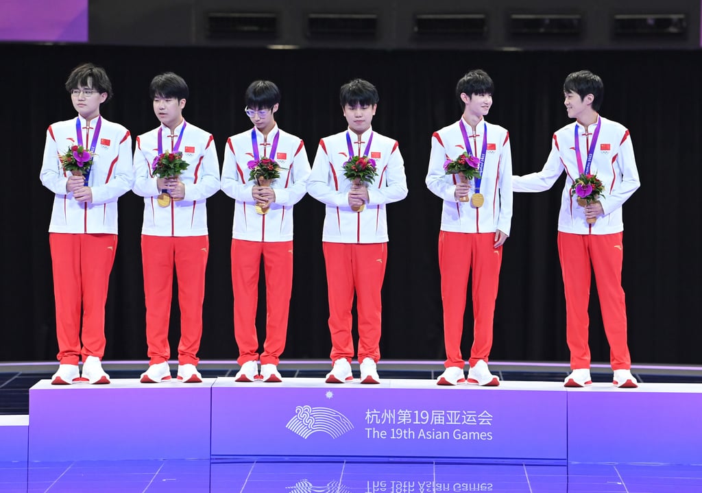 Team China win the very first esports medal after defeating Malaysia in the Arena of Valor final. Photo: Xinhua
