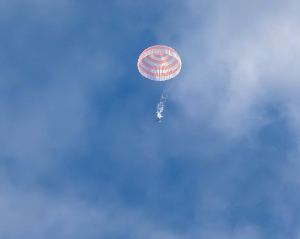 The Soyuz MS-23 space capsule carrying the International Space Station (ISS) crew descends beneath a parachute before landing in a remote area near Zhezkazgan, Kazakhstan on Wednesday. Photo: Nasa/Handout via Reuters The Soyuz MS-23 space capsule carrying the International Space Station (ISS) crew descends beneath a parachute before landing in a remote area near Zhezkazgan, Kazakhstan on Wednesday. Photo: Nasa/Handout via Reuters