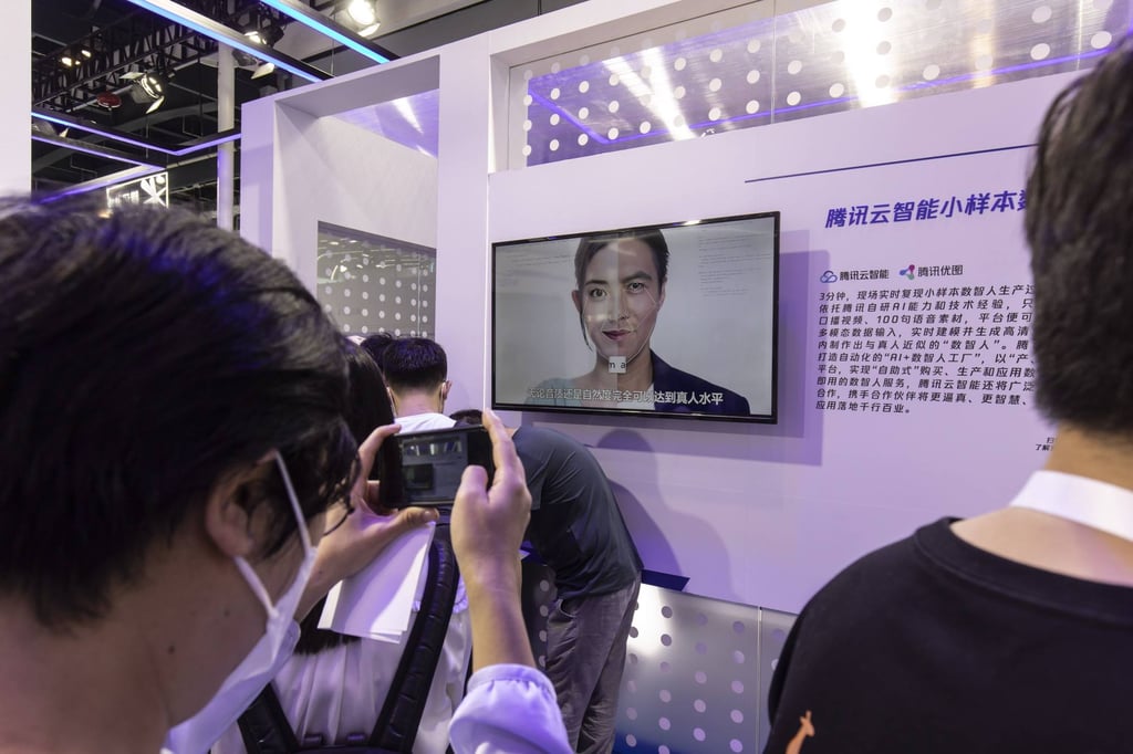 Attendees view a display on AI generative technology in Shanghai. Photo: Bloomberg Attendees view a display on AI generative technology in Shanghai. Photo: Bloomberg