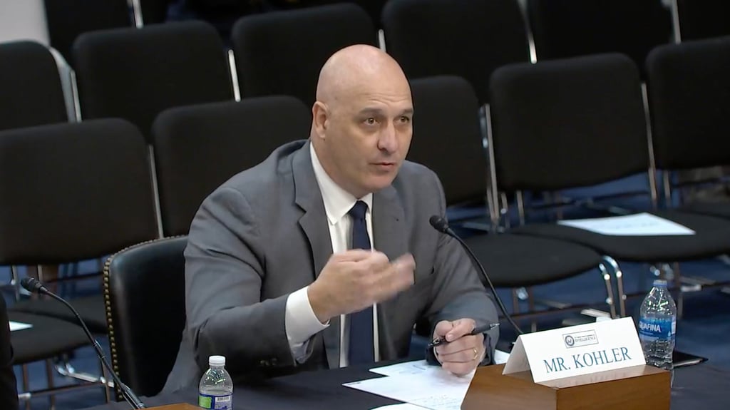 Alan Kohler, formerly with the FBI’s counter-intelligence division, testifies before the Senate Select Committee on Intelligence in Washington on Wednesday. Alan Kohler, formerly with the FBI’s counter-intelligence division, testifies before the Senate Select Committee on Intelligence in Washington on Wednesday.