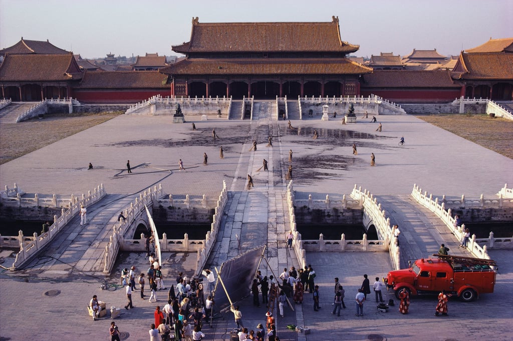 A split second before the cameras rolled for a take of 15-year-old Puyi’s failed attempt to escape by bicycle through the outer court of the Gate of Supreme Harmony. Photo: Basil Pao