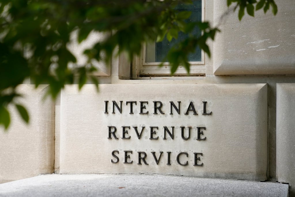 A sign is seen outside the Internal Revenue Service building in Washington in May 2021. Photo: AP A sign is seen outside the Internal Revenue Service building in Washington in May 2021. Photo: AP