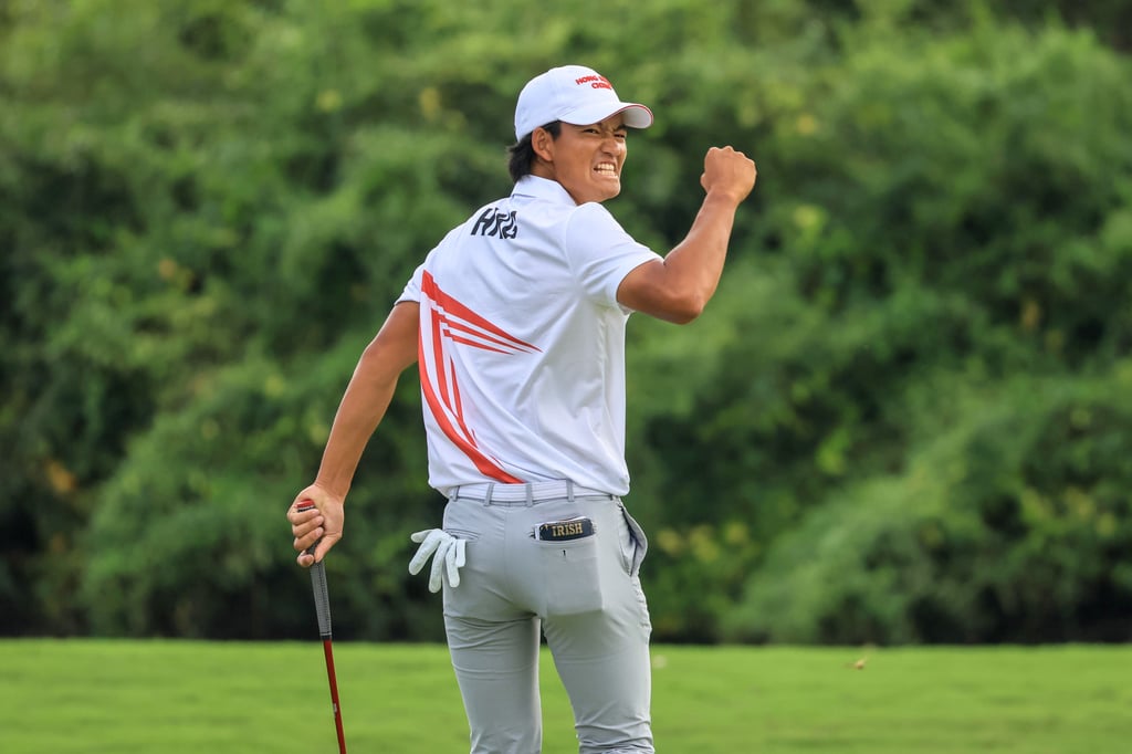 Hong Kong’s Taichi Kho celebrates after giving himself a two-inch putt to win gold at the Games. Photo: Dickson Lee Hong Kong’s Taichi Kho celebrates after giving himself a two-inch putt to win gold at the Games. Photo: Dickson Lee