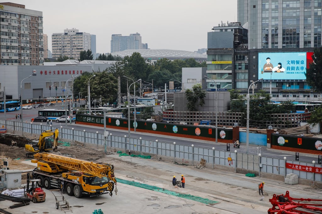 Workers at a construction site in Beijing on Monday. China has been stepping up efforts to revitalise its economy. Photo: EPA-EFE