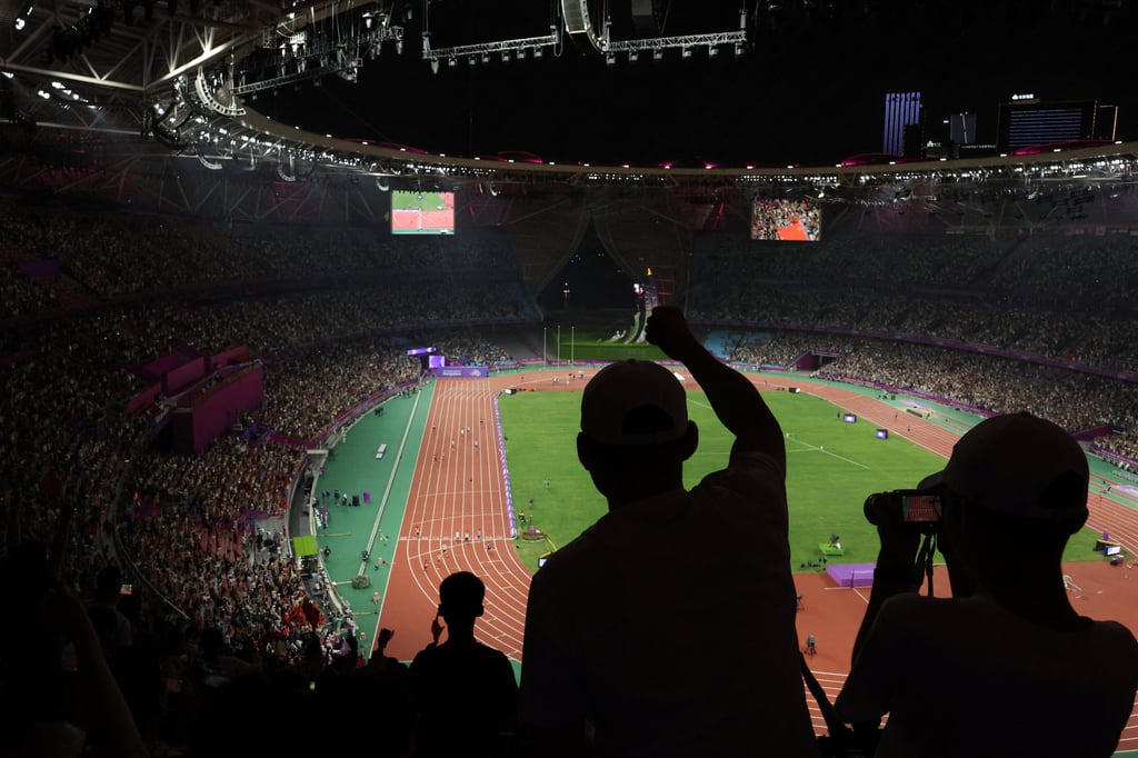 Spectators watch during the men’s 4x100m relay at the 2023 Asian Games in Hangzhou. Photo: Reuters