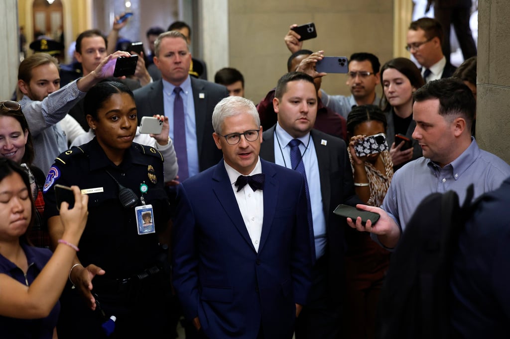 US House Speaker Pro Tempore Patrick McHenry is pursued by reporters at the US Capitol on Wednesday. Photo: TNS