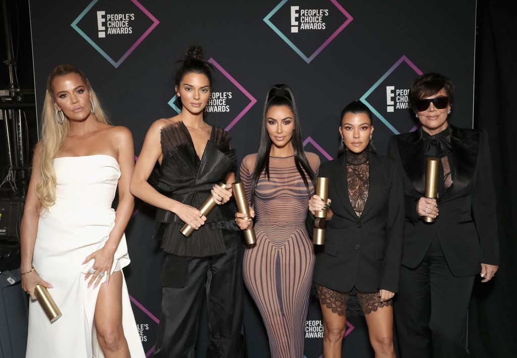 Khloé Kardashian, Kendall Jenner, Kim Kardashian, Kourtney Kardashian and Kris Jenner pose backstage during the 2018 E! People’s Choice Awards. Photo: Getty Images