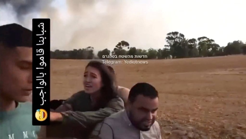 A screengrab from a social media video on Saturday shows Noa Argamani as she is taken hostage by Palestinian militants at an unknown location. Photo: Screengrab via Reuters A screengrab from a social media video on Saturday shows Noa Argamani as she is taken hostage by Palestinian militants at an unknown location. Photo: Screengrab via Reuters