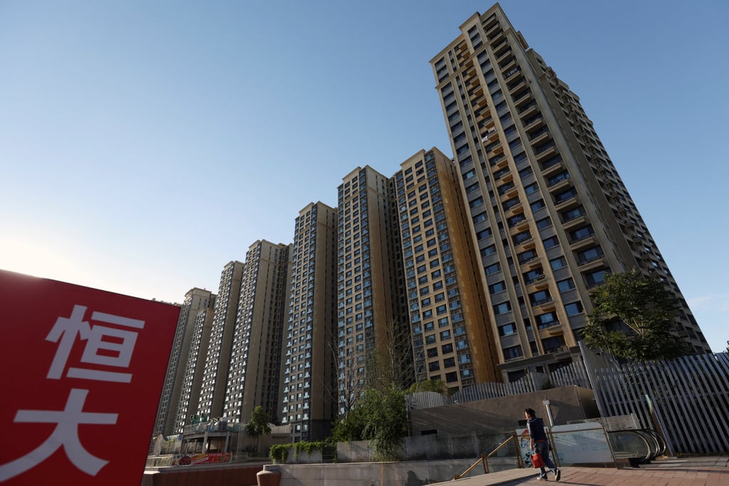 An Evergrande sign is seen near residential buildings at an Evergrande residential complex in Beijing, China. Photo: Reuters