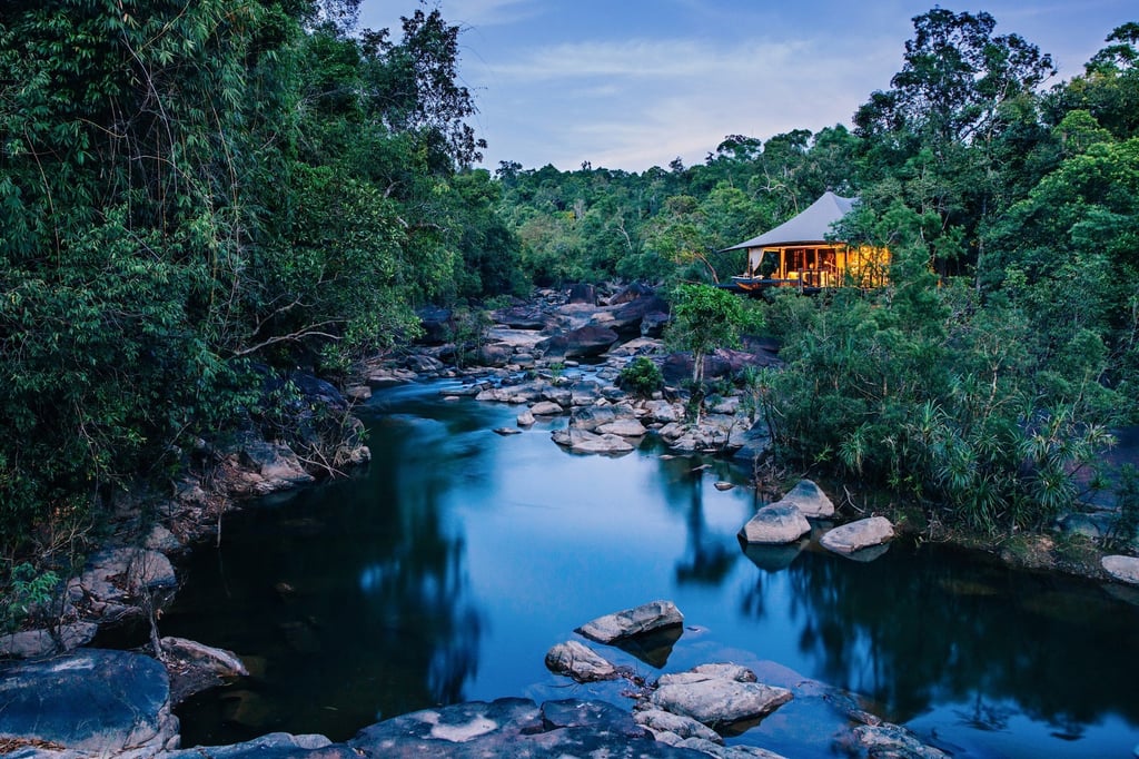 A luxurious tent by the riverside at Shinta Mani Wild resort, Cambodia. Photo: Shinta Mani Wild resort