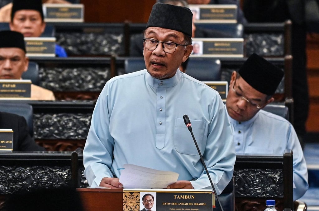 Anwar Ibrahim delivering his first national budget speech on February 24. Photo: Malaysia’s Department of Information/AFP