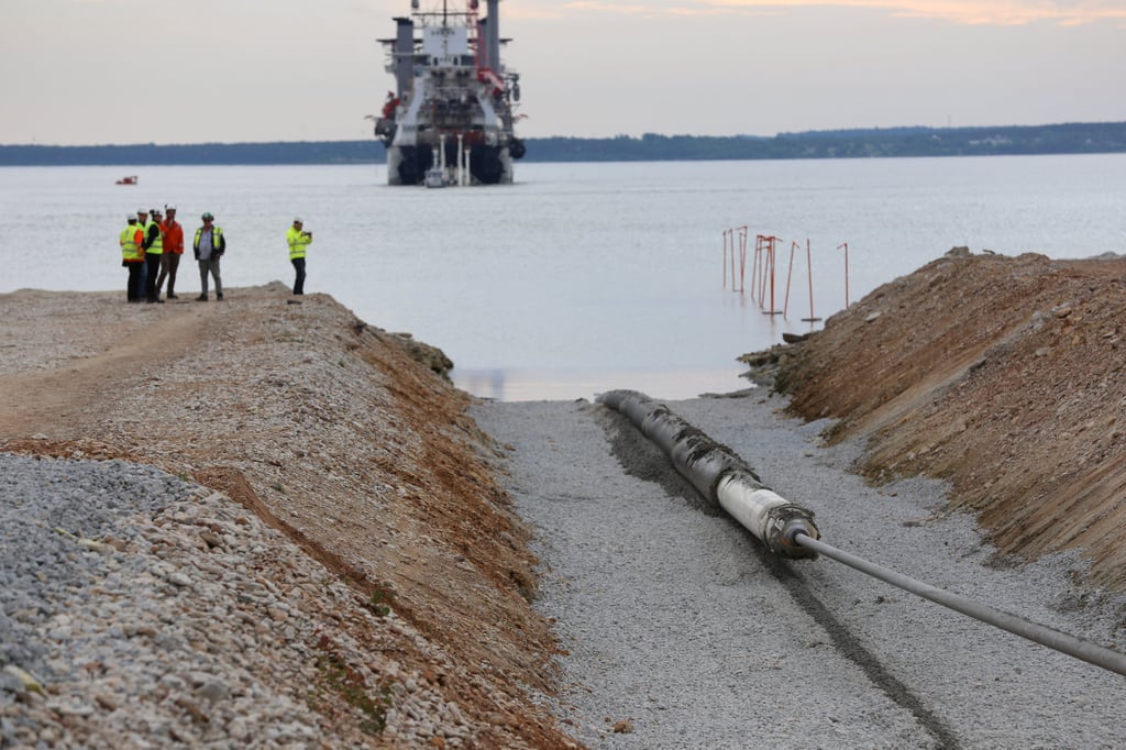 A view of the Balticconector pipeline as it is pulled into the sea in Paldiski, Estonia in 2019. Photo: Elering via Reuter