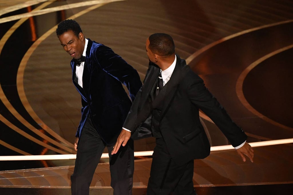 Actor Will Smith slaps comedian Chris Rock onstage during the 94th Oscars at the Dolby Theatre in Hollywood in March 2022. Photo: AFP Actor Will Smith slaps comedian Chris Rock onstage during the 94th Oscars at the Dolby Theatre in Hollywood in March 2022. Photo: AFP