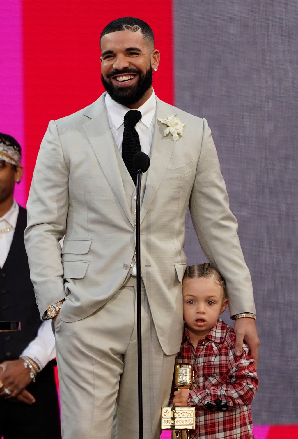 Drake accepts the artist of the decade award as he holds his son Adonis Graham at the Billboard Music Awards in May 2021, at the Microsoft Theatre in Los Angeles. Photo: AP Drake accepts the artist of the decade award as he holds his son Adonis Graham at the Billboard Music Awards in May 2021, at the Microsoft Theatre in Los Angeles. Photo: AP