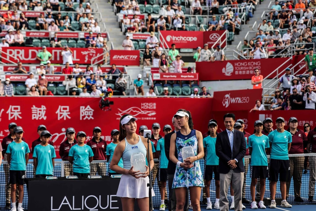 Taiwan’s Tsao Chia-yi (left) and China’s Tang Qianhui at the trophy ceremony after the doubles final. Photo: AFP