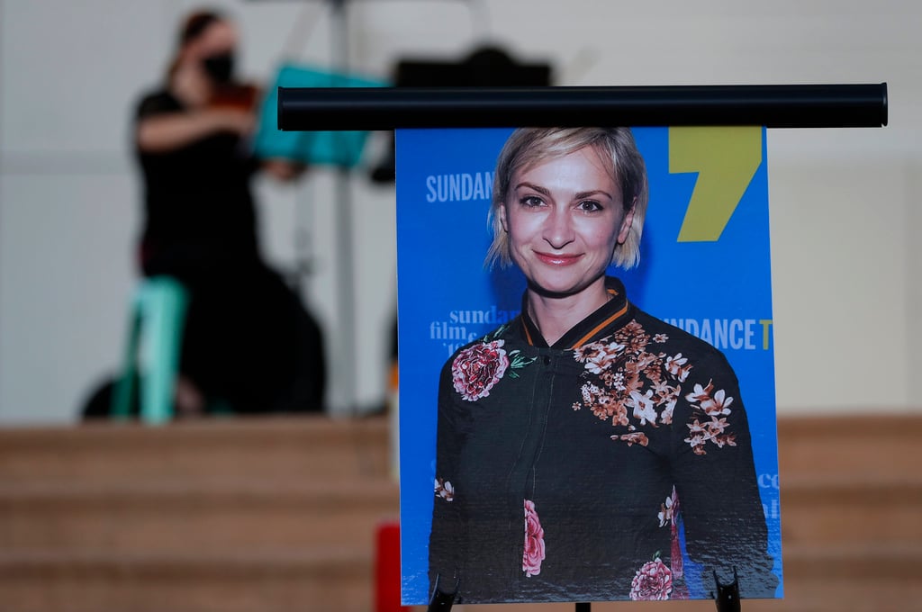 A musician plays a violin behind a photograph of cinematographer Halyna Hutchins during a vigil in her honour in Albuquerque, New Mexico, in October 2021. Photo: AP