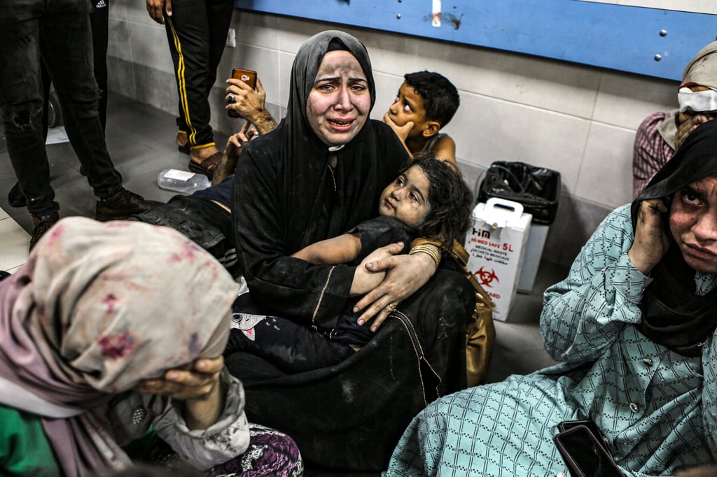 Palestinians wounded at Al-Ahli al-Arabi hospital at al-Shifa hospital, in Gaza City. An explosion killed hundreds at Al-Ahli al-Arabi hospital. Photo: AP