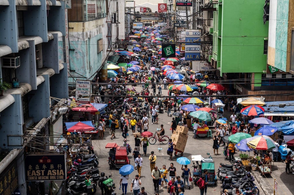 Shoppers at a market in Manila. The Maharlika fund will source cash from state banks and government-run corporations and invest it in currencies, bonds, equities and infrastructure projects. Photo: Bloomberg Shoppers at a market in Manila. The Maharlika fund will source cash from state banks and government-run corporations and invest it in currencies, bonds, equities and infrastructure projects. Photo: Bloomberg