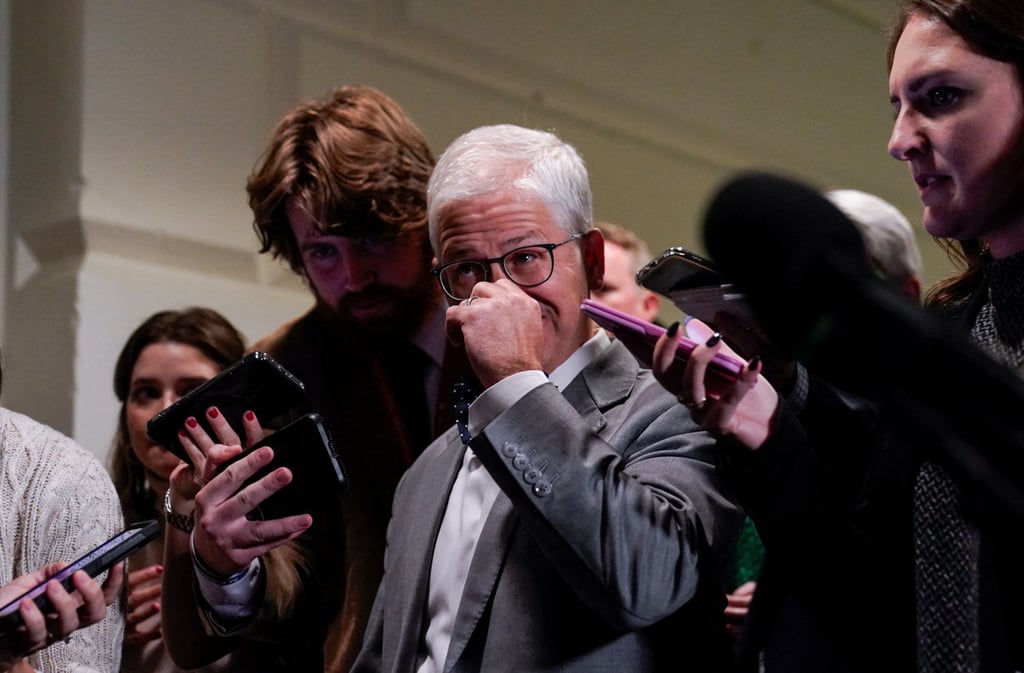 US Speaker of the House Pro Tempore Patrick McHenry is pursued by reporters in Washington after it was reported that there would not be further votes over congressman Jim Jordan’s speaker candidacy on Thursday. Photo: Reuters