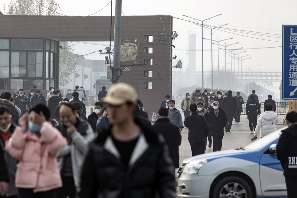 Employees of Foxconn Technology Group seen during their lunch break at the company’s manufacturing complex in Zhengzhou, capital of central Henan province, where the world’s largest iPhone assembly facility is located, on January 6, 2023. Photo: Bloomberg