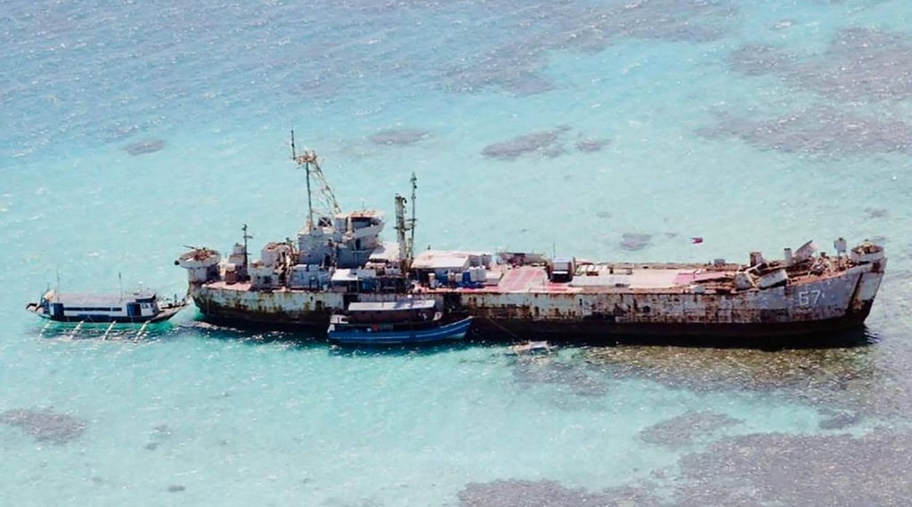 Resupply boats are seen anchored in 2021 at the crumbling Philippine naval vessel BRP Sierra Madre, grounded on Second Thomas Shoal in the contested Spratly Islands. Photo: Department National Defence Philippines Handout / AFP Resupply boats are seen anchored in 2021 at the crumbling Philippine naval vessel BRP Sierra Madre, grounded on Second Thomas Shoal in the contested Spratly Islands. Photo: Department National Defence Philippines Handout / AFP