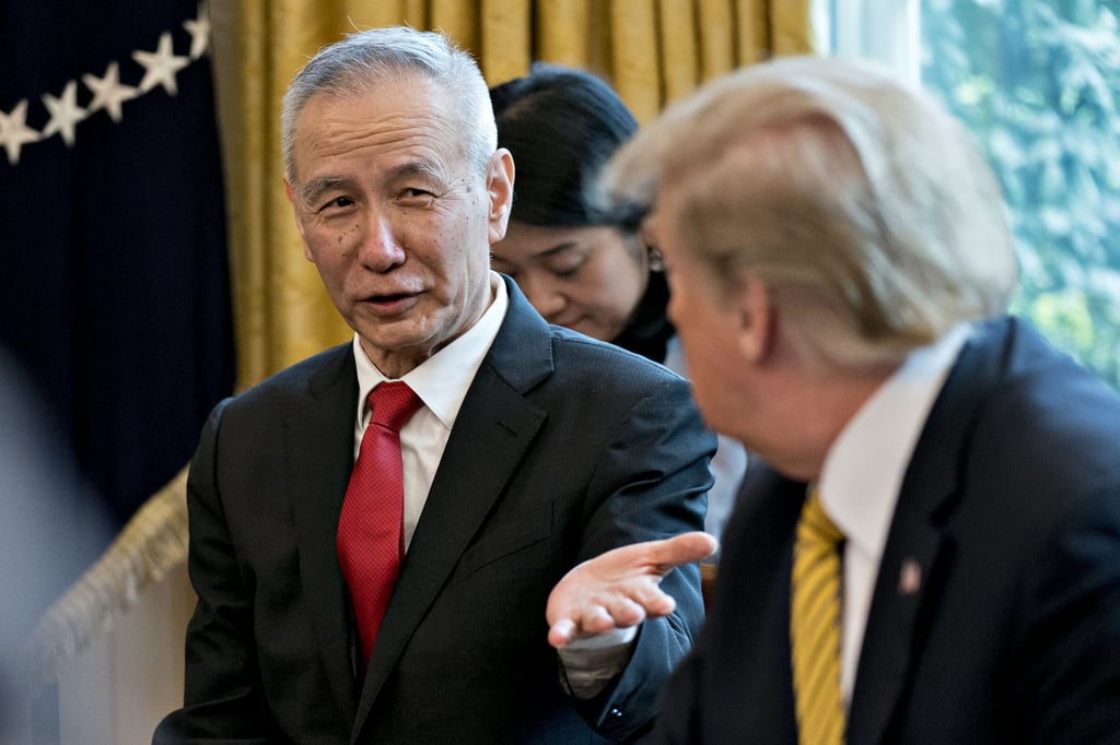 Liu He, seen here in April 2019 as China’s vice-premier, speaks to former US president Donald Trump at the White House in Washington. Photo: Bloomberg
