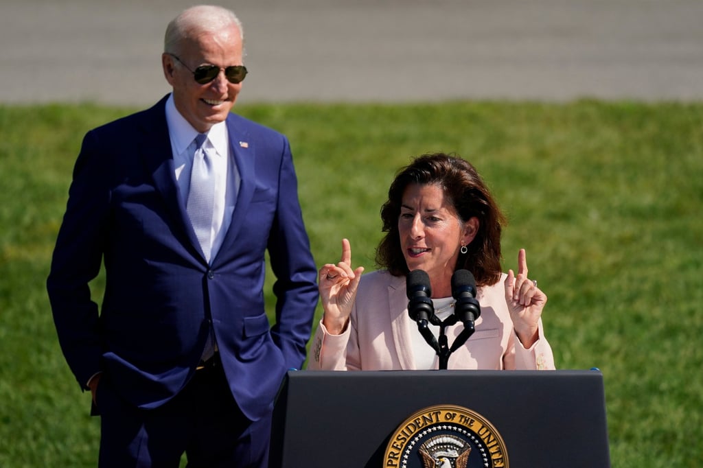US President Joe Biden looks on as Commerce Secretary Gina Raimondo speaks on the South Lawn of the White House on August 9, 2022, in Washington. The Biden administration is designating 31 tech hubs in 32 states and Puerto Rico to help spur innovation and create jobs in the specific industries that are concentrated in these areas. Photo: AP