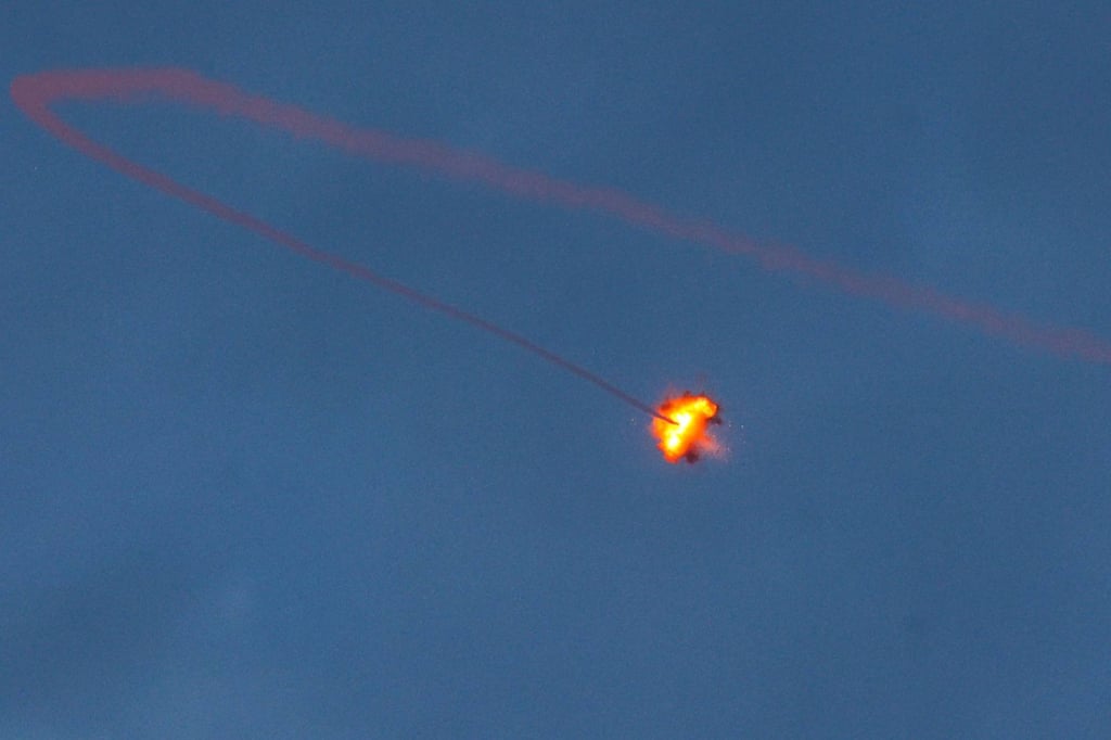 An Israeli missile launched from the Iron Dome system intercepts a rocket. Photo: AFP