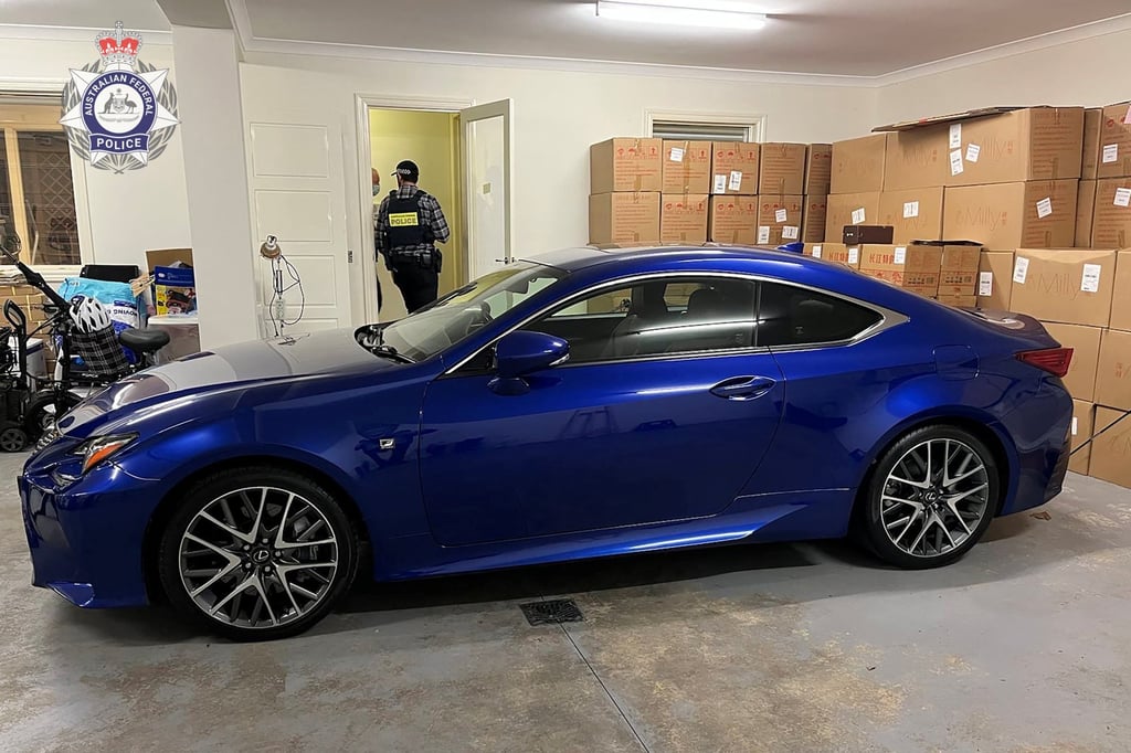Australian Federal Police search a property during a countrywide crackdown on a money-laundering crime syndicate. Photo: Australia Federal Police/Handout via Reuters Australian Federal Police search a property during a countrywide crackdown on a money-laundering crime syndicate. Photo: Australia Federal Police/Handout via Reuters