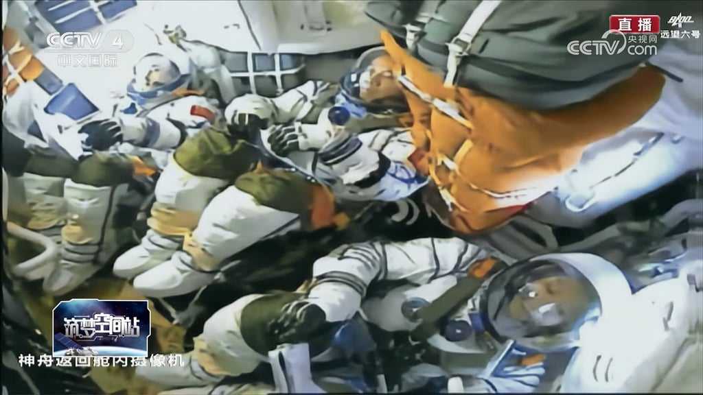 Chinese astronauts Tang Hongbo (right), Tang Shengjie (centre) and Jiang Xinlin are shown during the Shenzhou 17 take-off from the Jiuquan Satellite Launch Centre in the Gobi Desert. Photo: CCTV