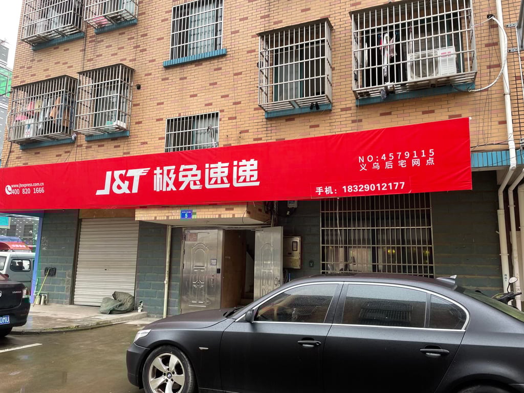 A J&T signage in Beixiazhu Village in Yiwu, Zhejiang, which is on the frontier of a bloody price war of delivery services. Photo: Tracy Qu
