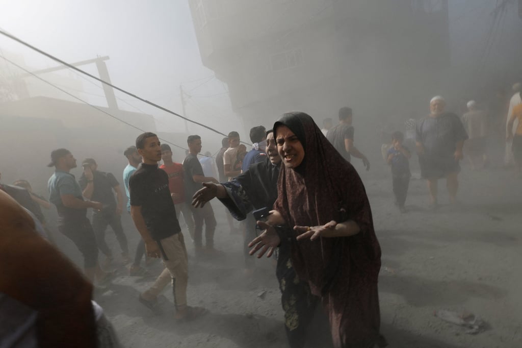 The aftermath of Israeli strikes on houses in Khan Younis in the southern Gaza Strip. Photo: AP The aftermath of Israeli strikes on houses in Khan Younis in the southern Gaza Strip. Photo: AP
