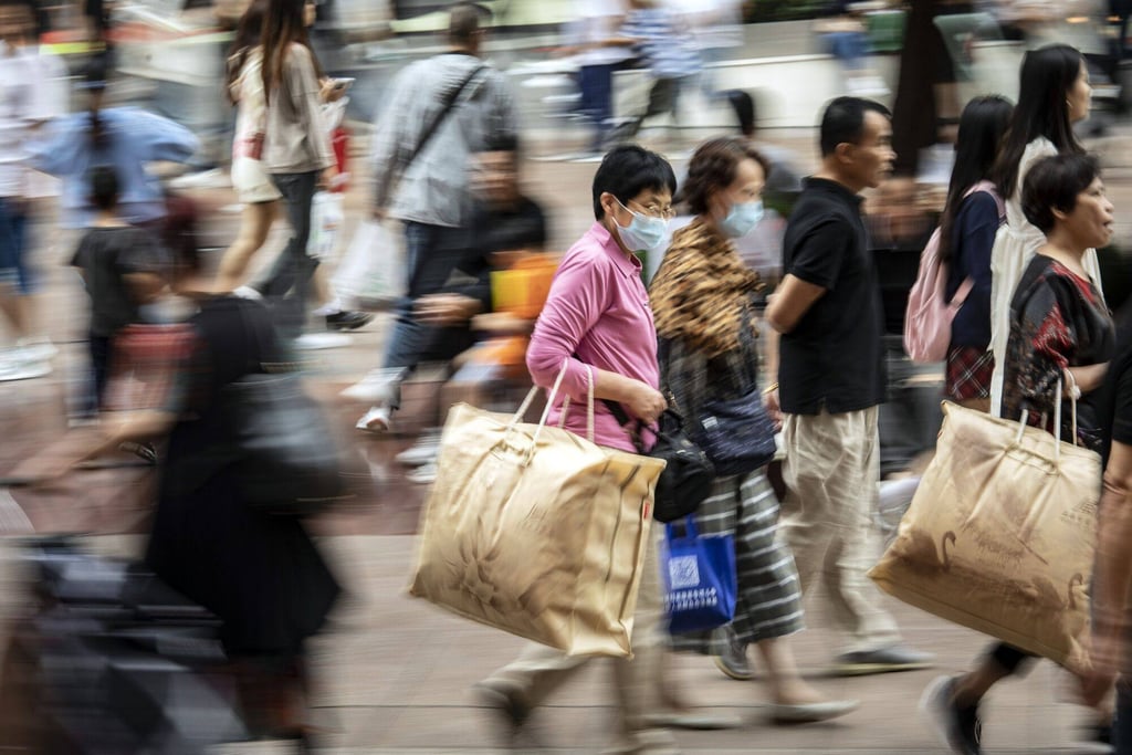 Pedestrians and shoppers on Nanjing Road shopping street in Shanghai, China, on Tuesday, Oct. 3, 2023. China’s Golden Week got off to a promising start as tourist trips and revenue jumped through the start of the holiday, suggesting some resilience in consumer appetites. Photo: Bloomberg