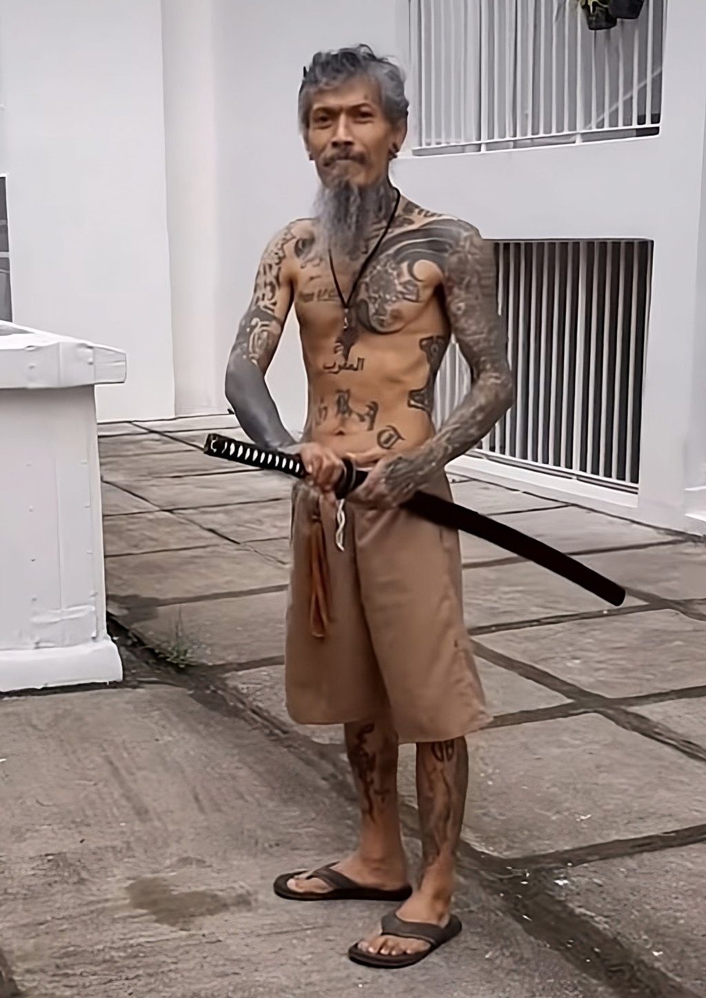 Joel Ezekiel poses for the camera before unsheathing his sword in this still from the video he posted on social media. Photo: Facebook/Joel Ezekiel II Joel Ezekiel poses for the camera before unsheathing his sword in this still from the video he posted on social media. Photo: Facebook/Joel Ezekiel II