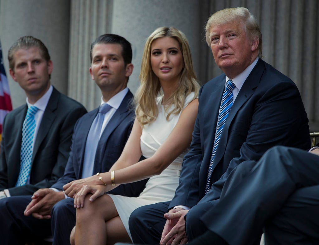 Donald Trump, right, sits with his children, from left, Eric Trump, Donald Trump Jr, and Ivanka Trump. Photo: AP