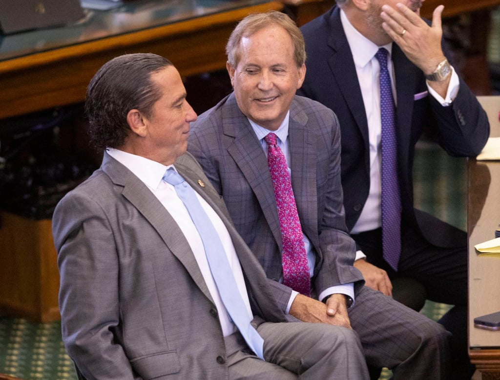Texas Attorney General Ken Paxton, centre. Photo: Juan Figueroa / The Dallas Morning News / TNS