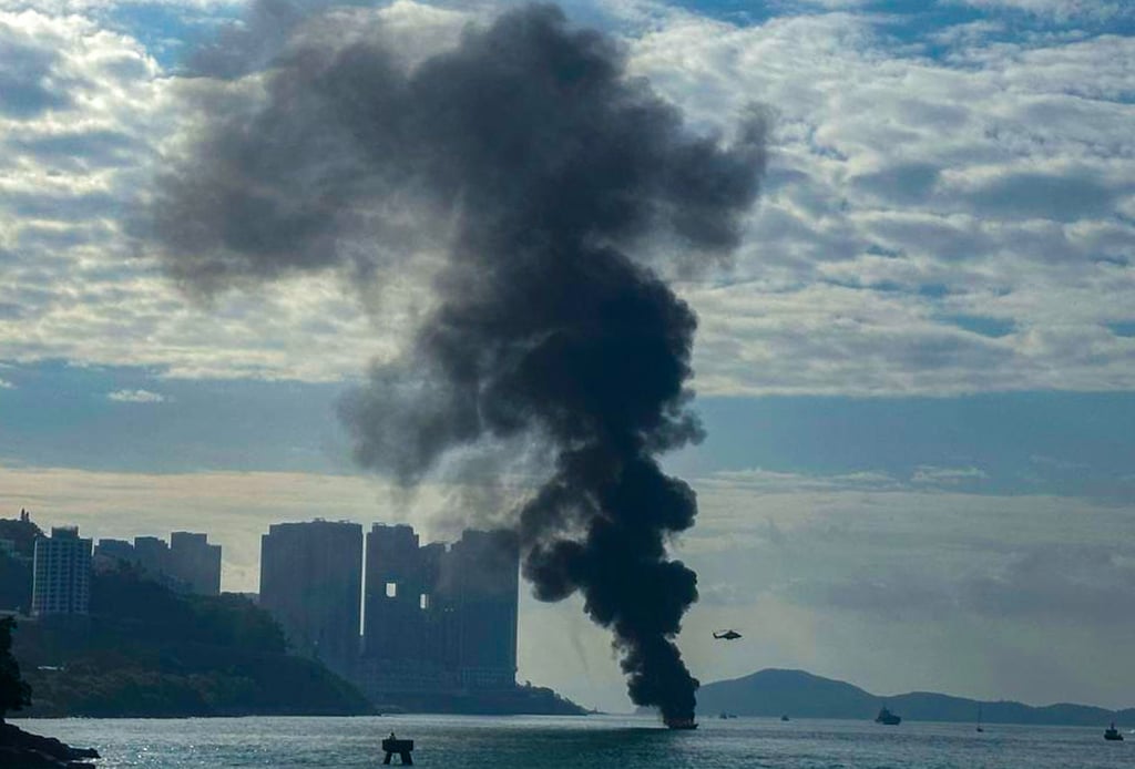 Dense smoke was seen billowing out of the burning boat. Photo: Handout Dense smoke was seen billowing out of the burning boat. Photo: Handout