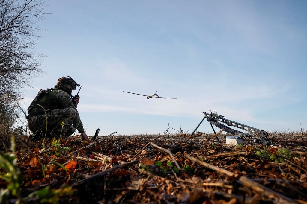 A Ukrainian soldier launching a drone. Photo: Reuters