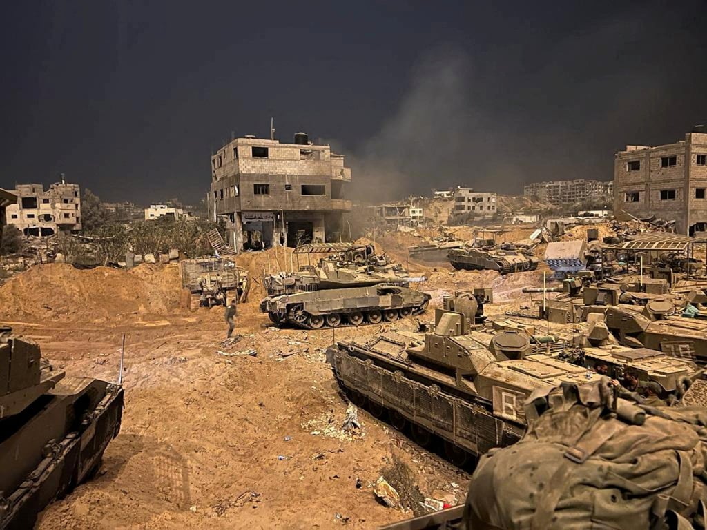 Israeli armoured vehicles at a location given as Gaza. Photo: Israel Defence Forces via Reuters Israeli armoured vehicles at a location given as Gaza. Photo: Israel Defence Forces via Reuters