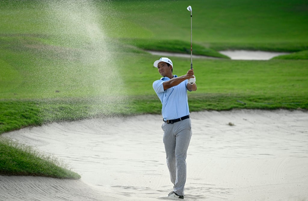 Taichi Kho hits out of a fairway bunker during the second round of the International Series event. Photo: Asian Tour. Taichi Kho hits out of a fairway bunker during the second round of the International Series event. Photo: Asian Tour.